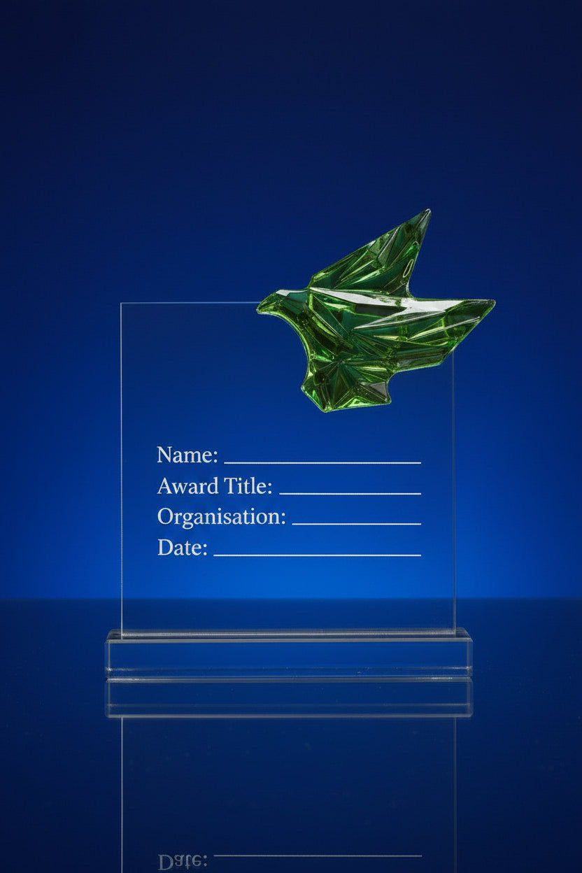 Green crystal bird on a clear base against a blue background